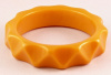 BB180 marigold triangle carved bangle
